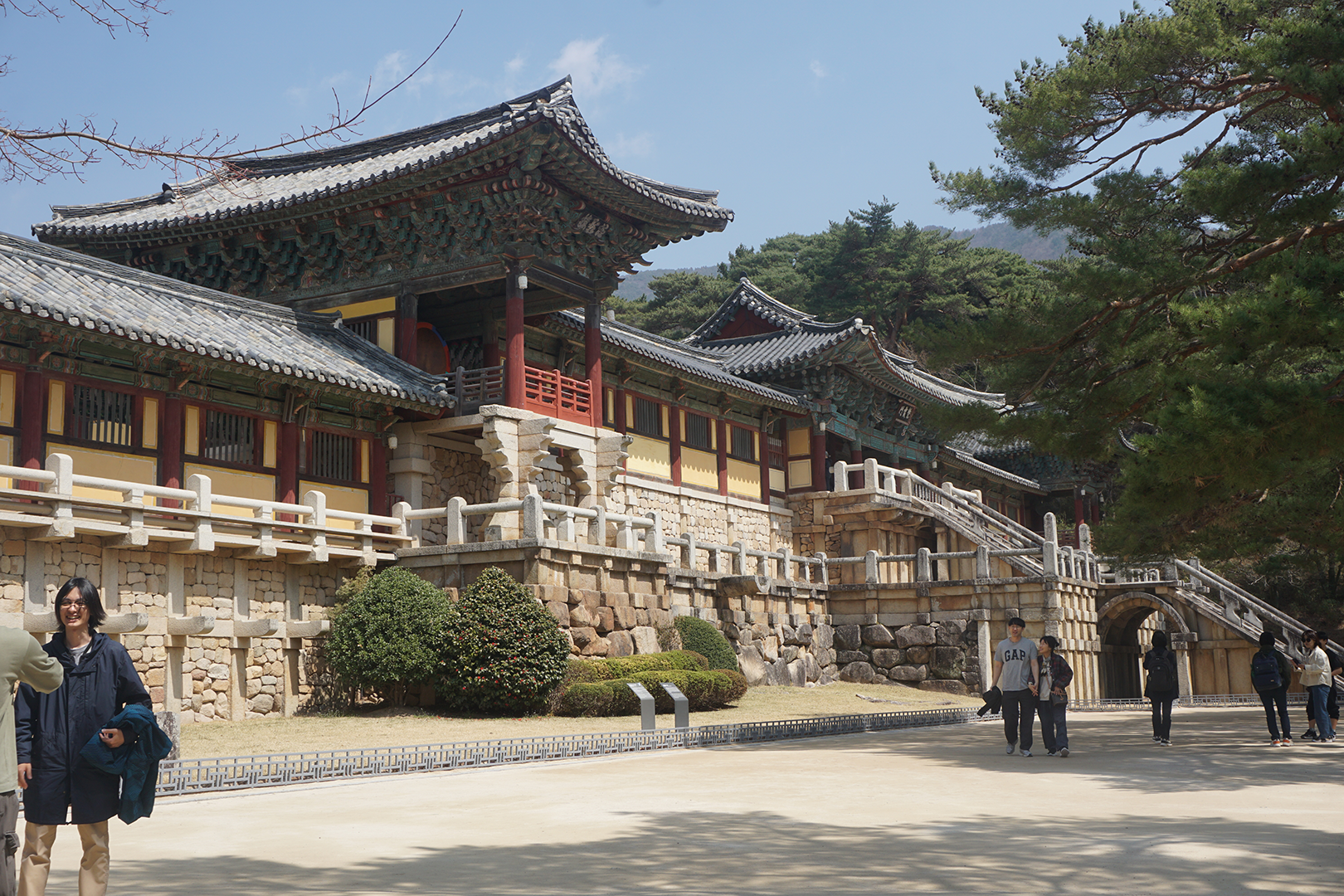Outdoor view of large temple surrounded by trees